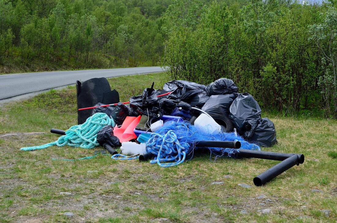 junk placed in front of house ready for removal